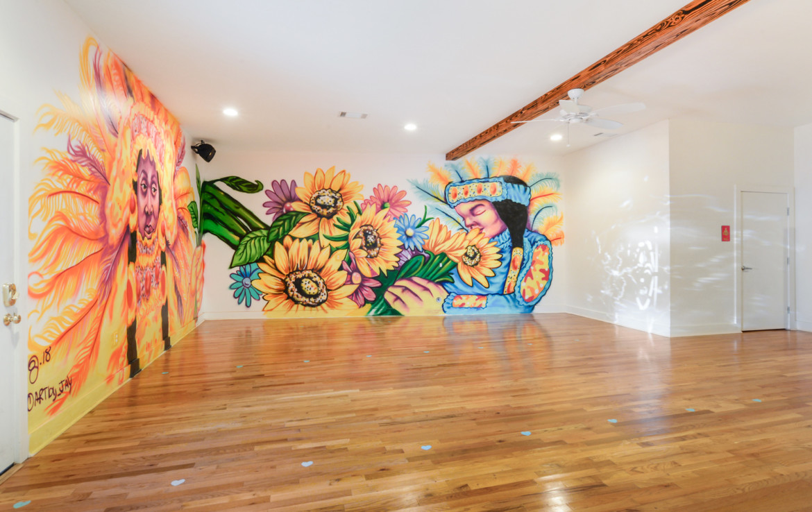 Unfurnished interior room with painted mural