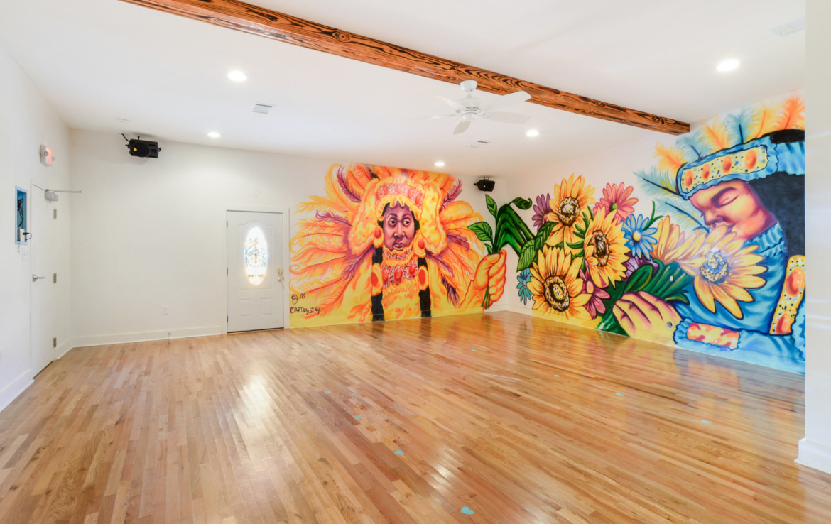 Unfurnished interior room with painted mural