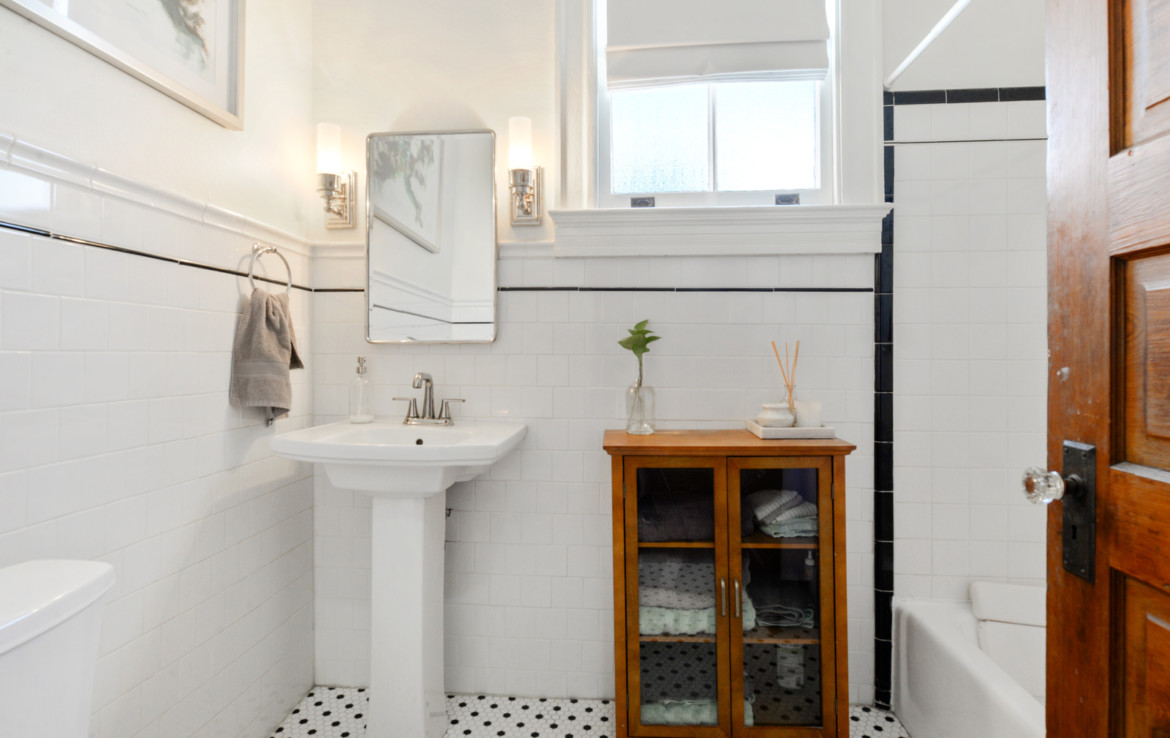 Bathroom sink vanity and wooden linen cabinet