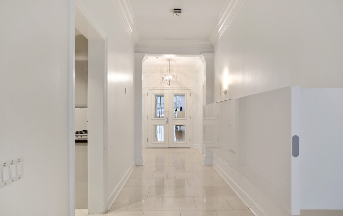 Hallway with French double doors