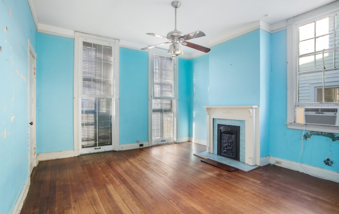 Unfurnished living room with bright blue walls