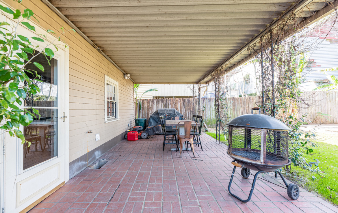 Backyard with brick porch