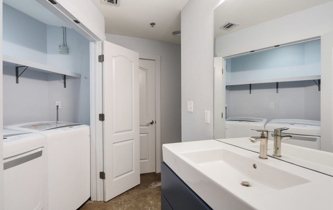 Laundry room with washer, dryer and sink