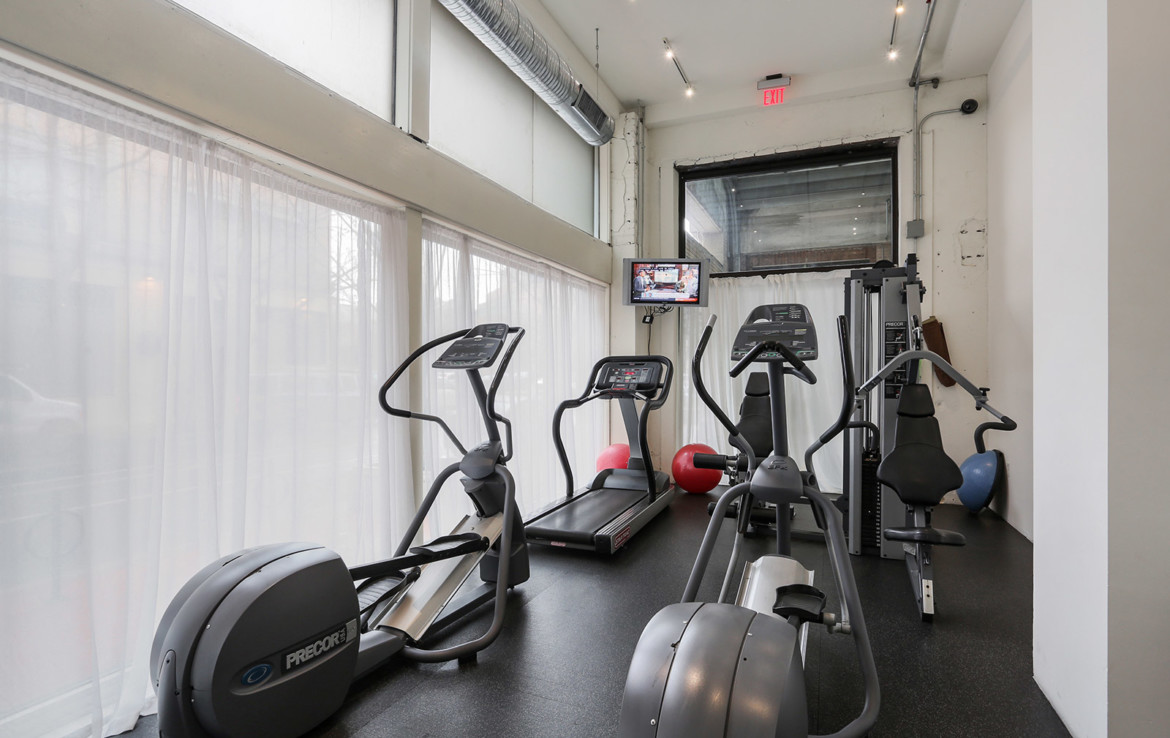 Exercise room with cardio equipment