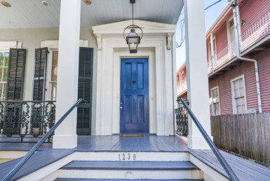 front porch with blue door