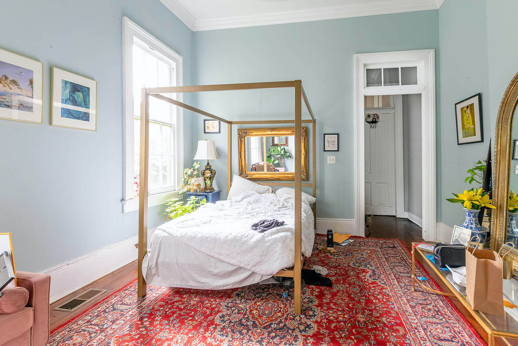 Bedroom with light blue walls