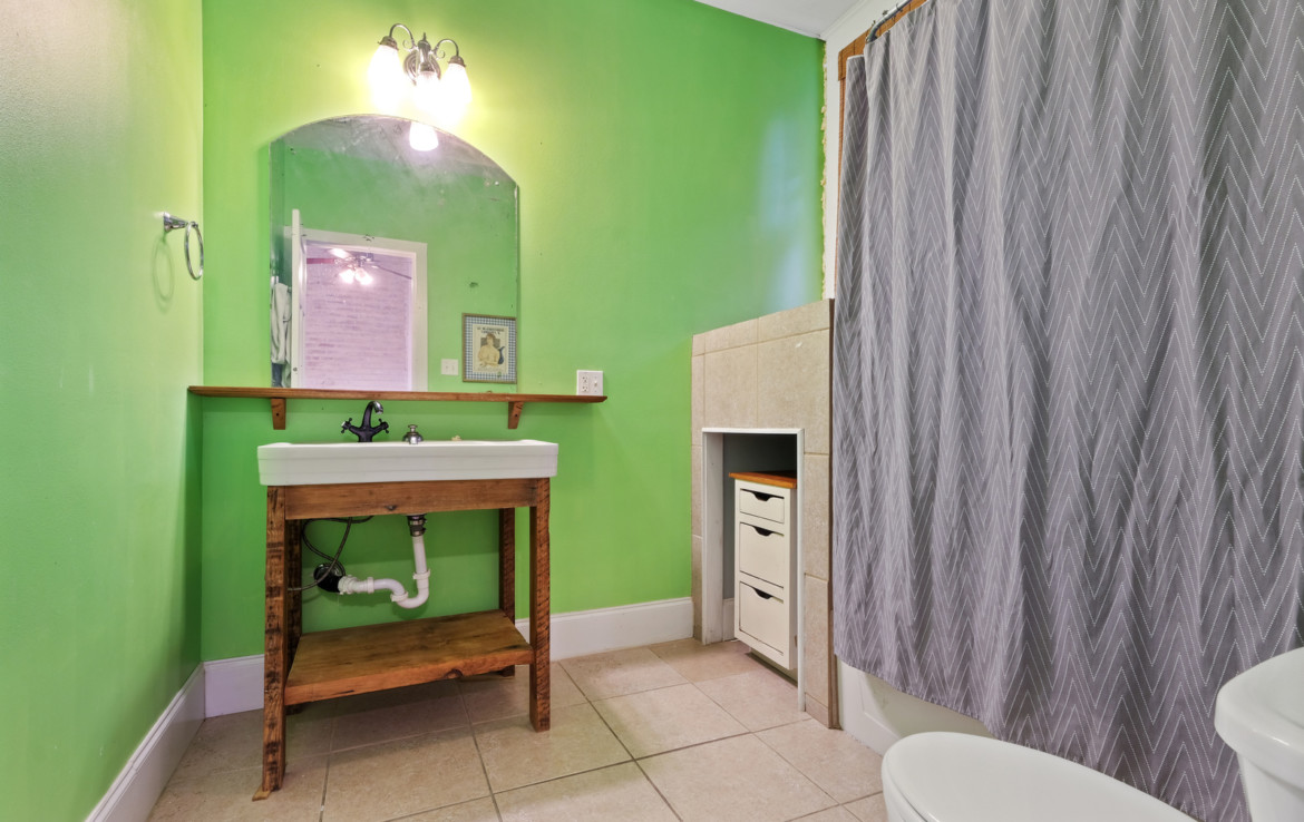 bathroom with green walls
