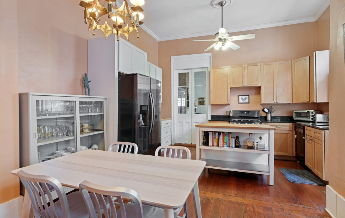 kitchen with island and dining table