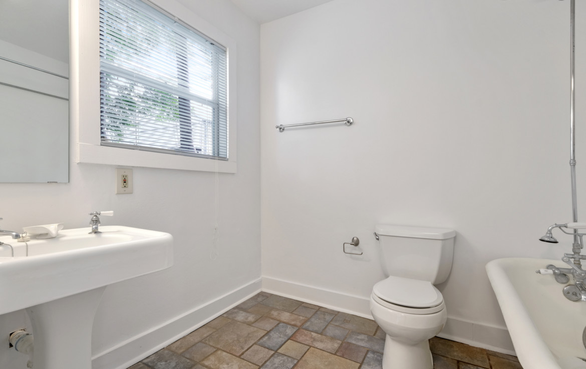 Bathroom with sink, toilet and tub
