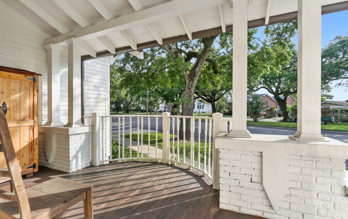 front porch with seating overlooking street