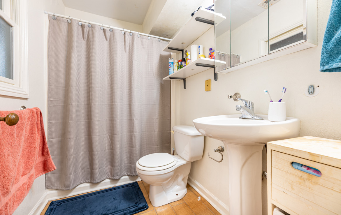 Bathroom with sink, toilet and shower