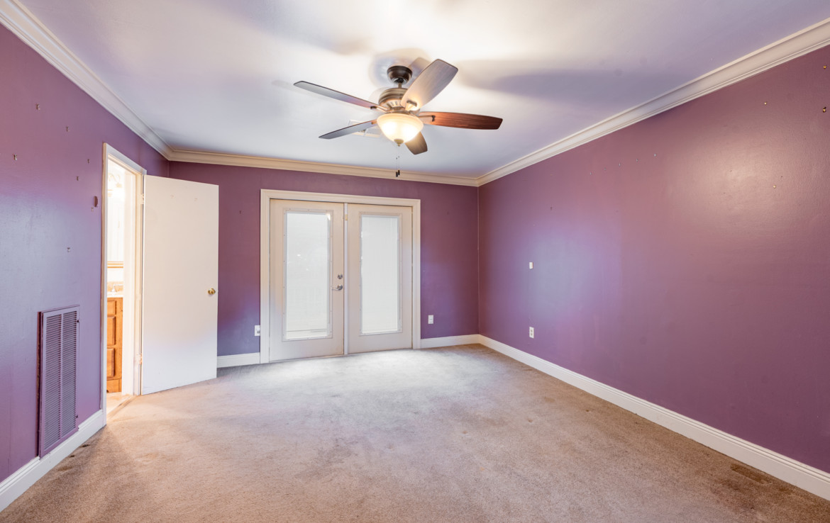 bedroom with purple walls