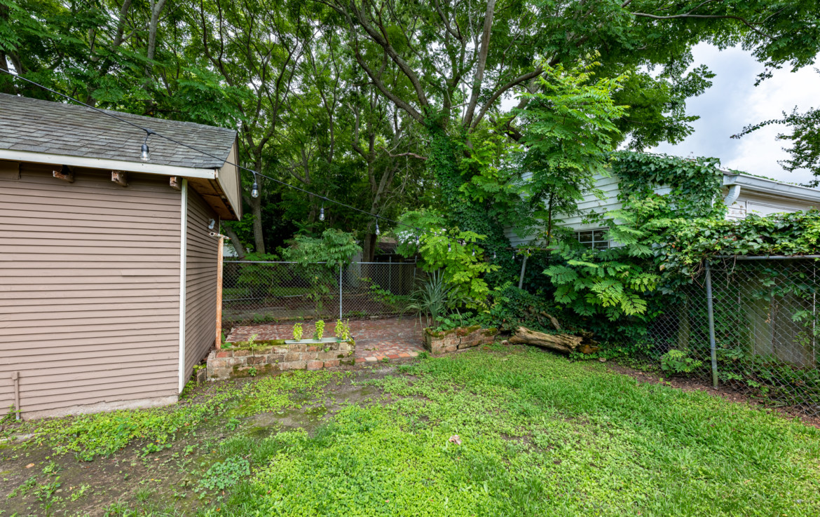 backyard with fence and shed
