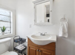 MLS-14-Unit-A-bathroom-single-vanity-off-bedroom-black-walls