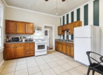 MLS-16-Kitchen-white-appliances-granite-counters