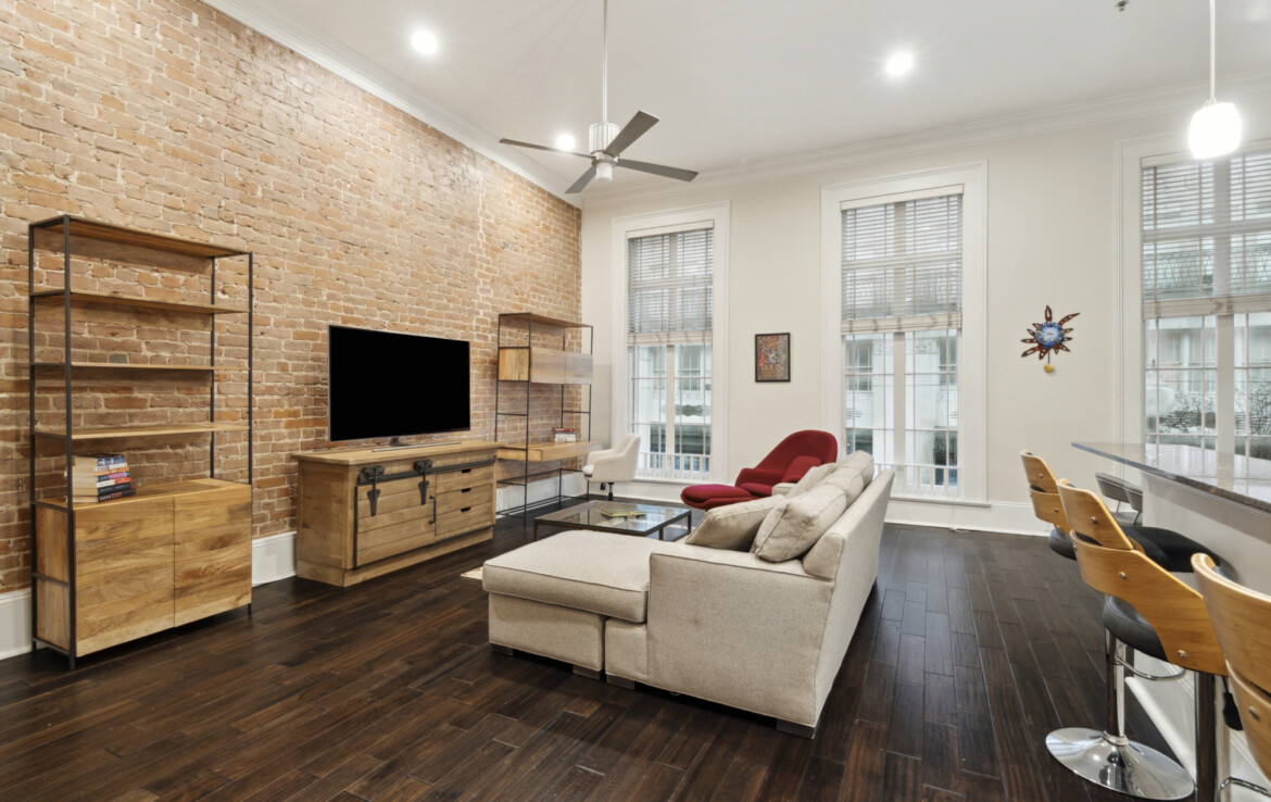 Living Room with exposed brick