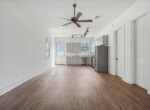 238447_004_1600x1067_mls-vacant-kitchen-hardwood-floors-fans-track-lighting