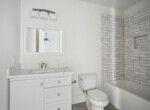 238447_012_1600x1067_mls-bathroom-tub-shower-combo-single-vanity-toliet
