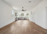 238447_015_1600x1067_mls-view-of-kitchen-wood-floors-ceiling-fan-track-lighting