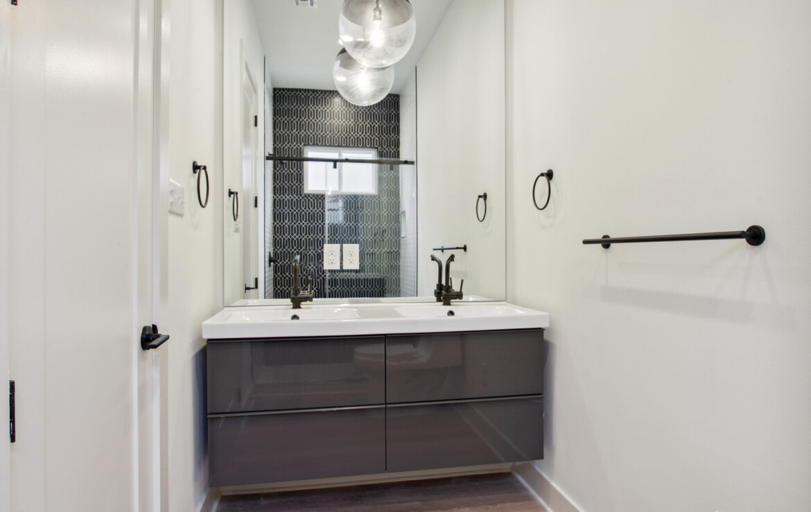 Primary bathroom with vanity and walk in shower