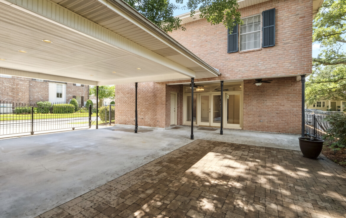 MLS-16-patio-looking-back-at-house-furniture-gone