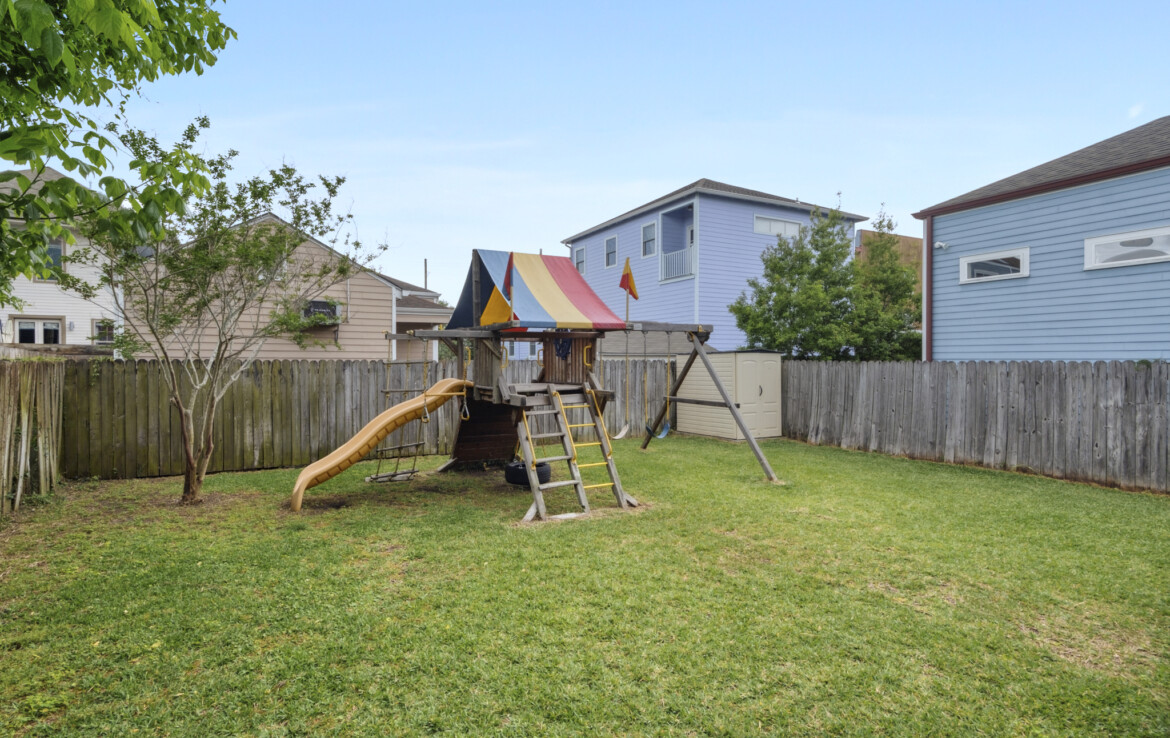 Fenced-backyard-play-set