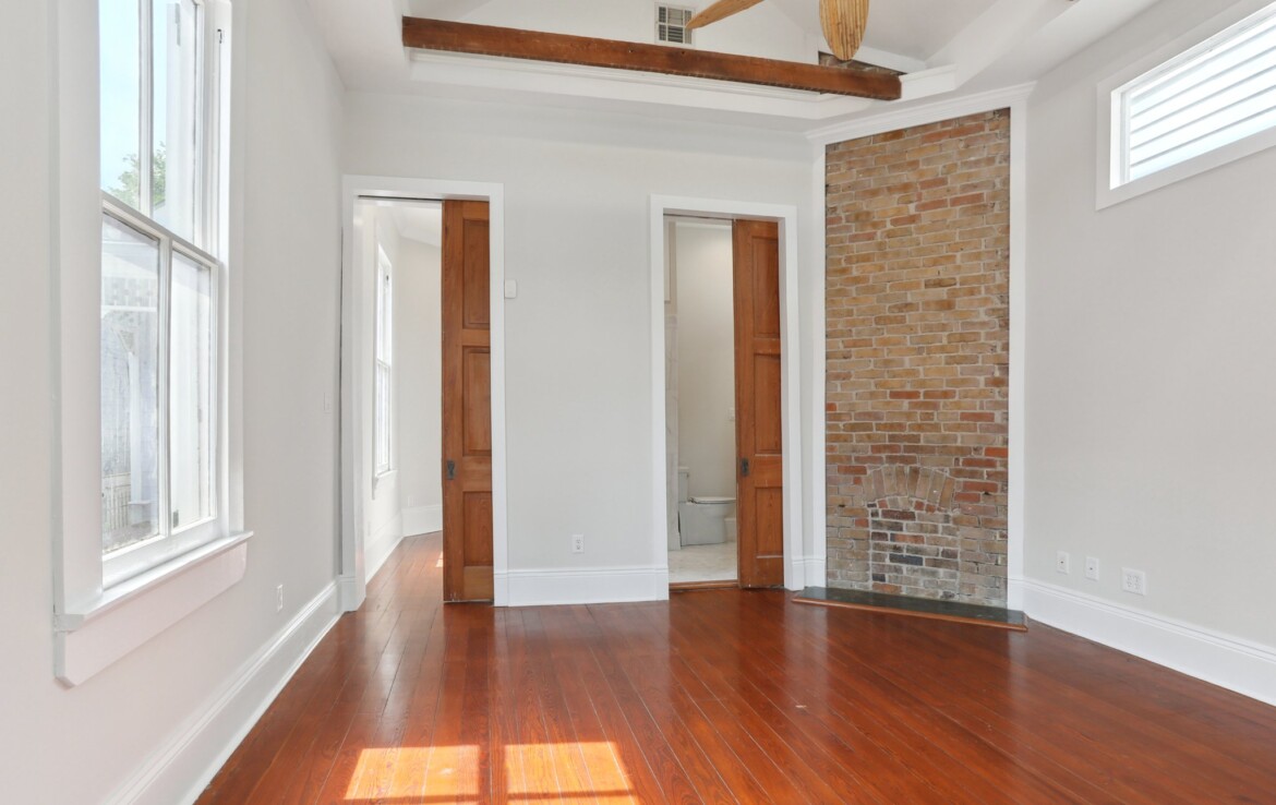 016-bedroom-paocket-doors-en-suite-exposed-brick