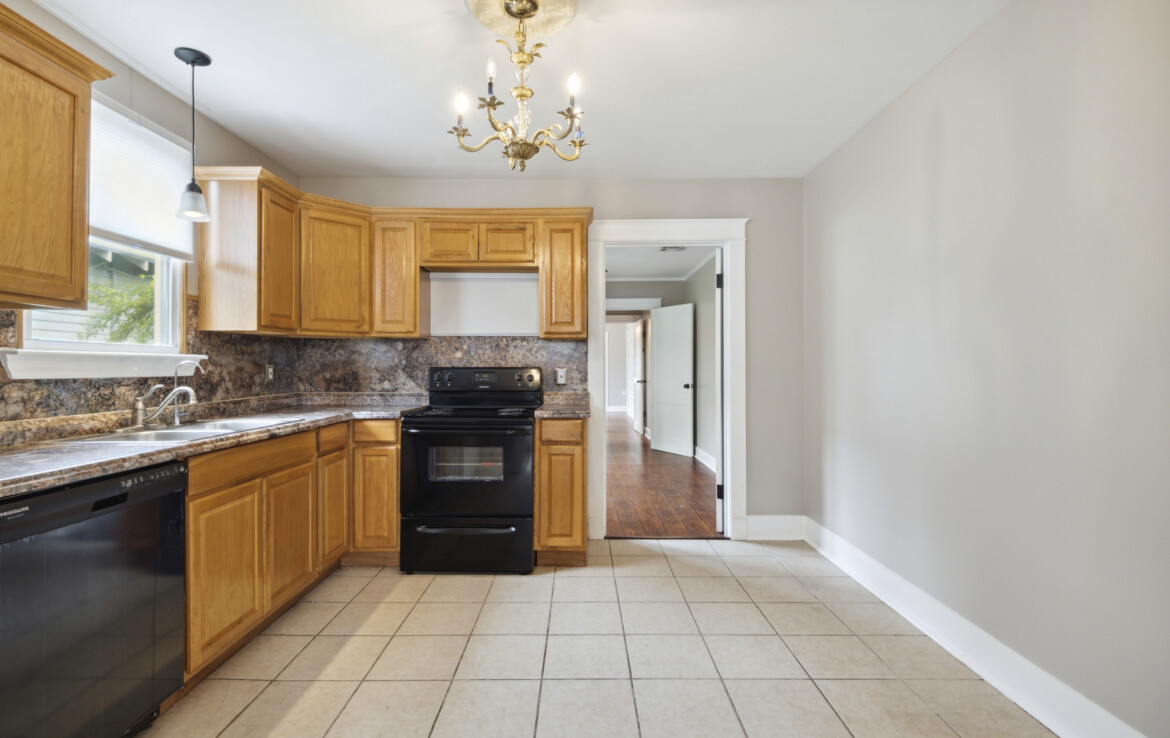 MLS-11-unit-two-kitchen-facing-bedroom