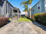 MLS-25-side-yard-palm-trees-parking-pad