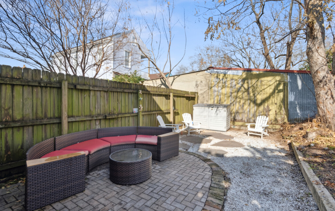 spacious backyard sitting area, fenced in