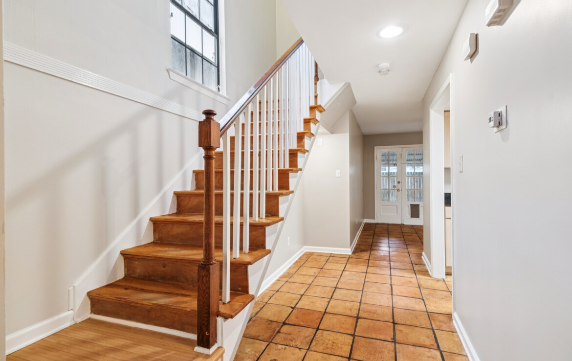 stairs leading upstairs, hallway